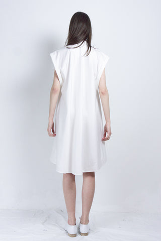 White sleeveless post-gender shirt